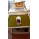 Casita de muñecas con accesorios.